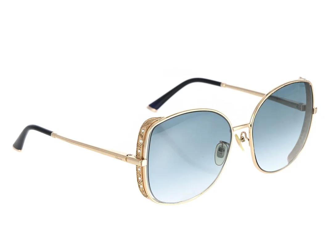 SOLGLASÖGON, CHOPARD, *2, SCHD48S, 59 17, 0300, 140, guldfärgade bågar, mörka glas, putsduk, etui, kartong, cert. — Accessoarer/Solglasögon — Kaplans