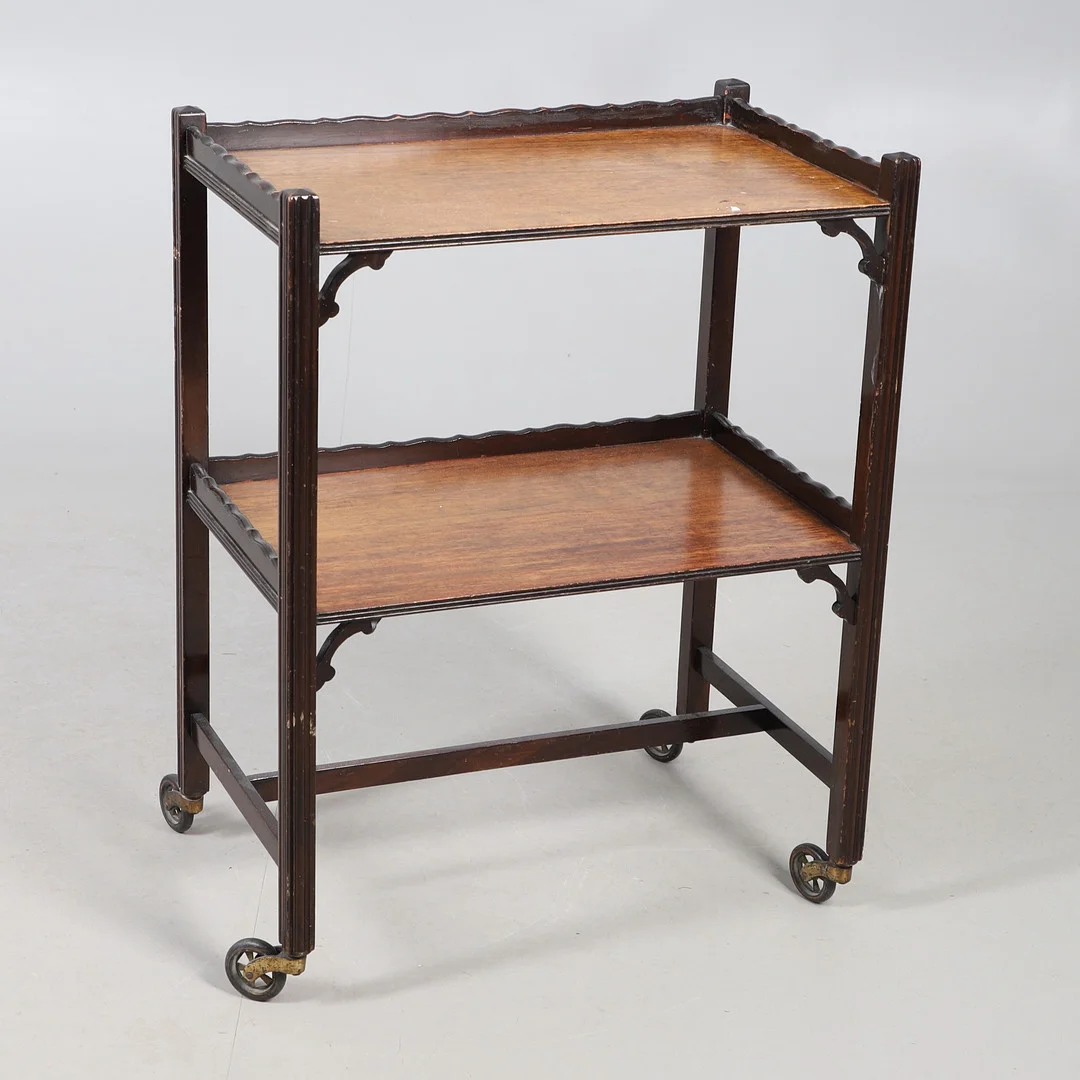 EDWARDIAN MAHOGANY TWO-TIER TEA TROLLEY. — Cupboards, Cabinets & Shelves — Lawrences Auctioneers