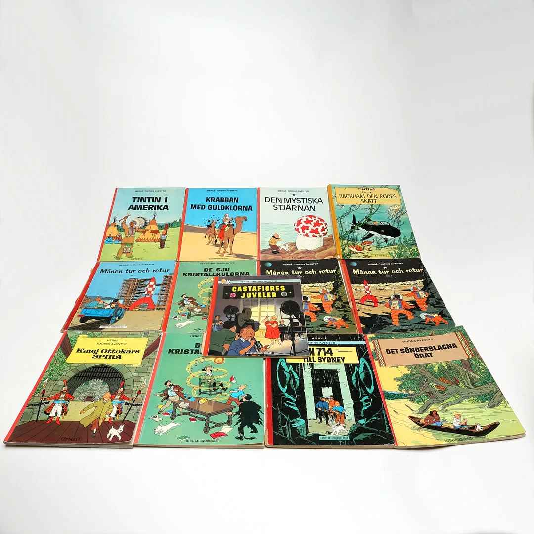 SERIEBÖCKER, TINTIN, 13 st, varav en med hård pärm, Rackham den Rödes skatt. — Comics — Kalmar Auktionsverk