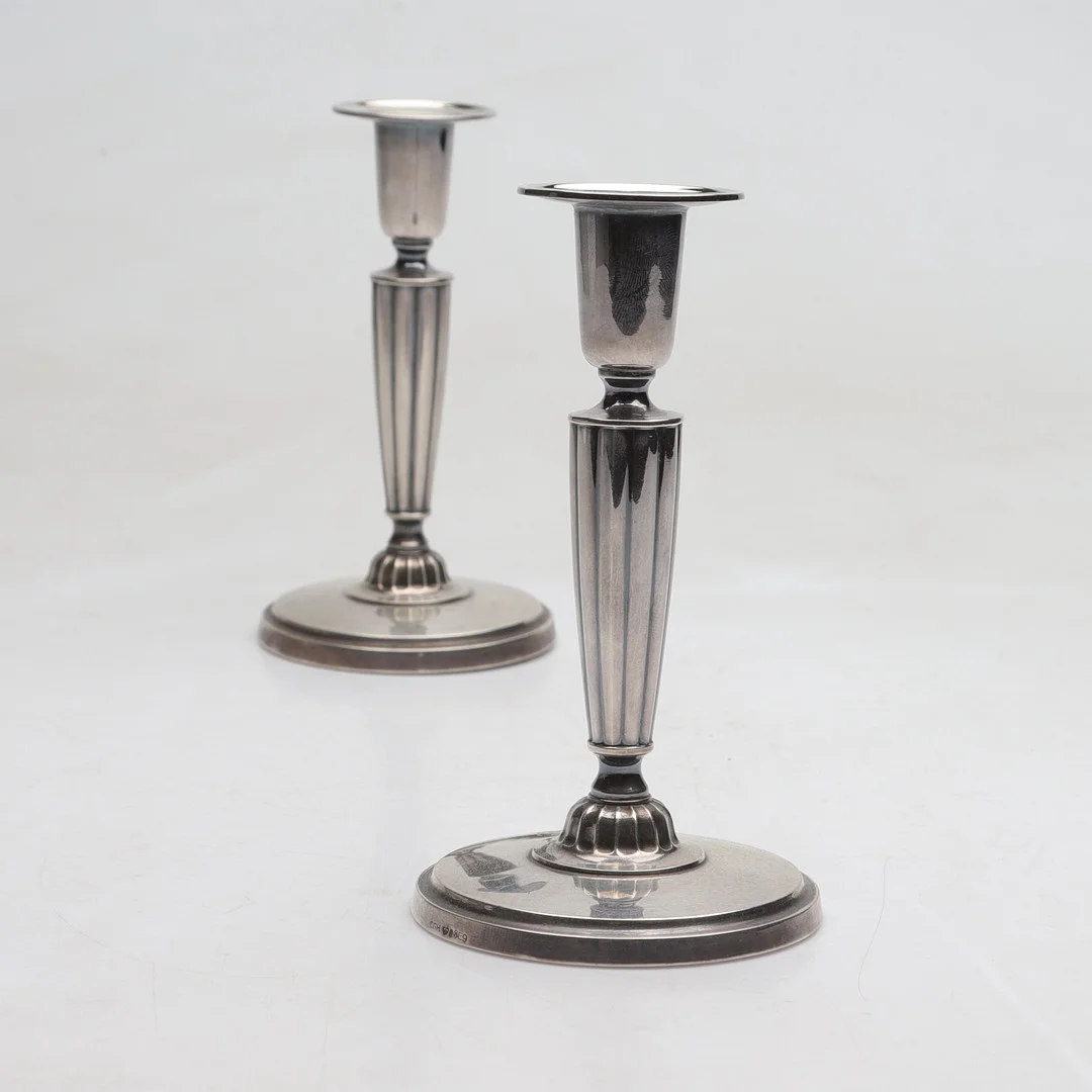 C.G. HALLBERG. ljusstakar, 1 par, silver, Stockholm, 1955. Totalvikt ca 347 g. — Candlesticks — Gomér & Andersson Norrköping