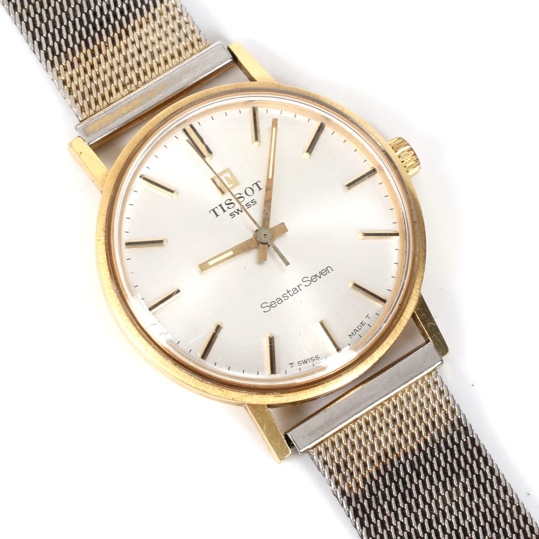 ARMBANDSUR, 18k guld, manuell, Tissot Seastar Seven. 1900-talets andra hälft. — Wristwatches — Stadsauktion Sundsvall