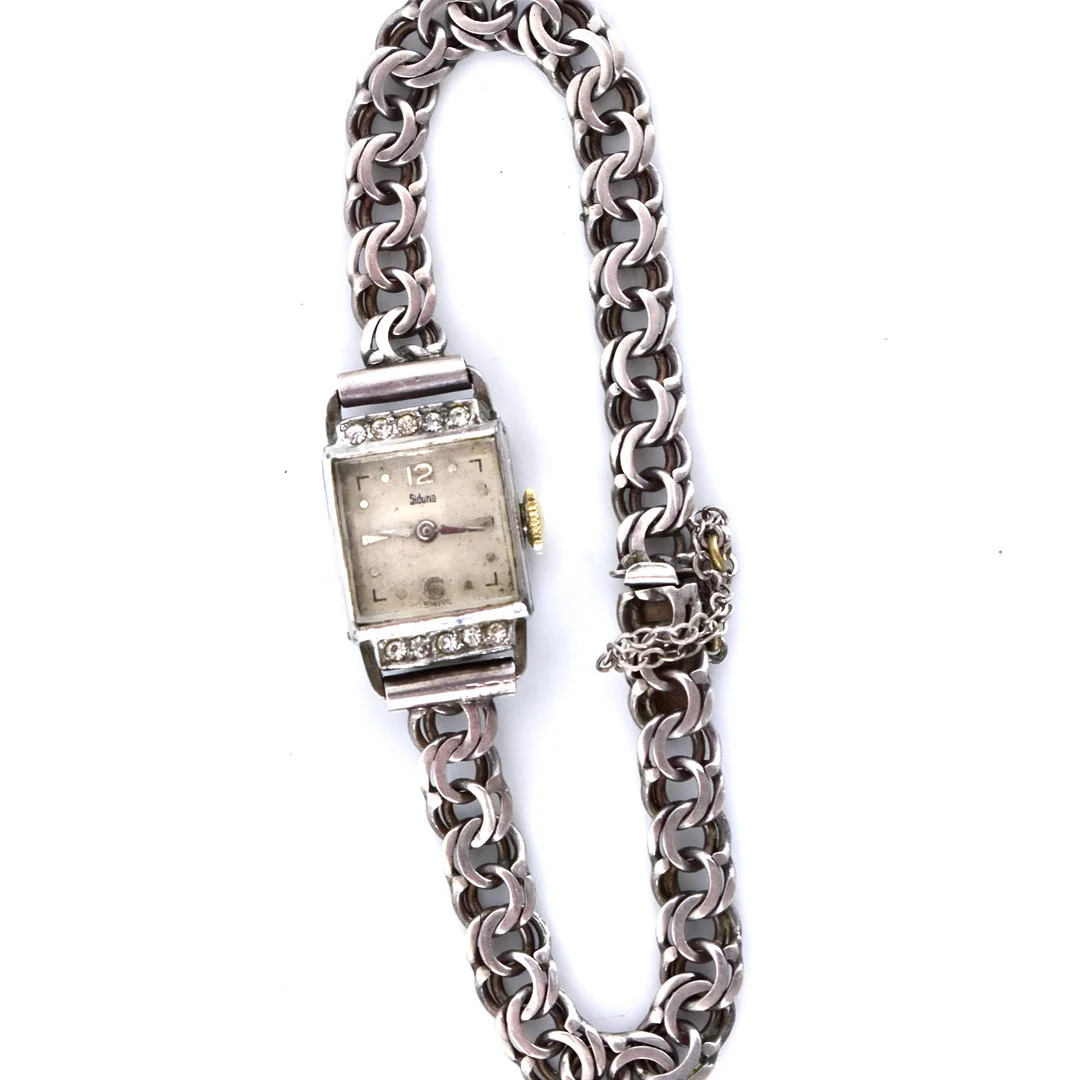 DAMARMBANDSUR, Siduna, bismarckslänk, silver. — Wristwatches — Halmstads Auktionskammare