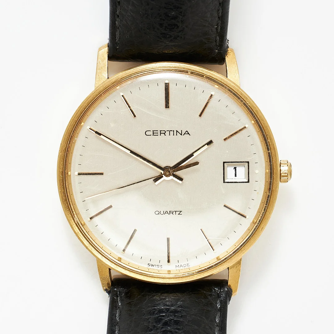 CERTINA, armbandsur, 33,5 mm, 18K guld, quartz, ca 1985. — Wristwatches — Stockholms Auktionsverk Magasin 5