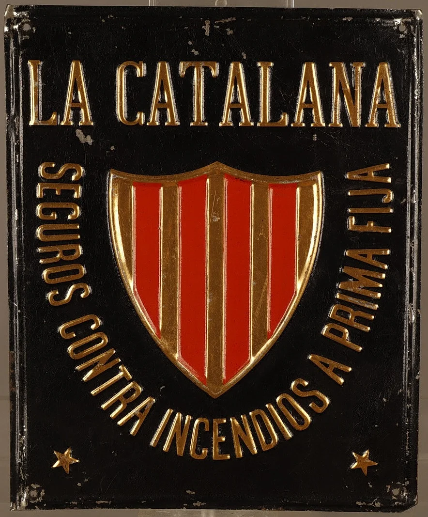 La Catalana, placa publicitaria en hojalata estampada y pintada. — Other collectables — Barcelona Auctions