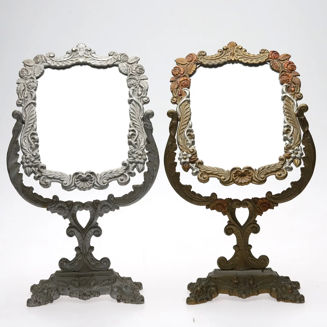 BORDSSPEGLAR. Ett par, Bemålat gjutjärn, Brevens bruk, 1900-tal. — Mirrors — Örebro Stadsauktioner