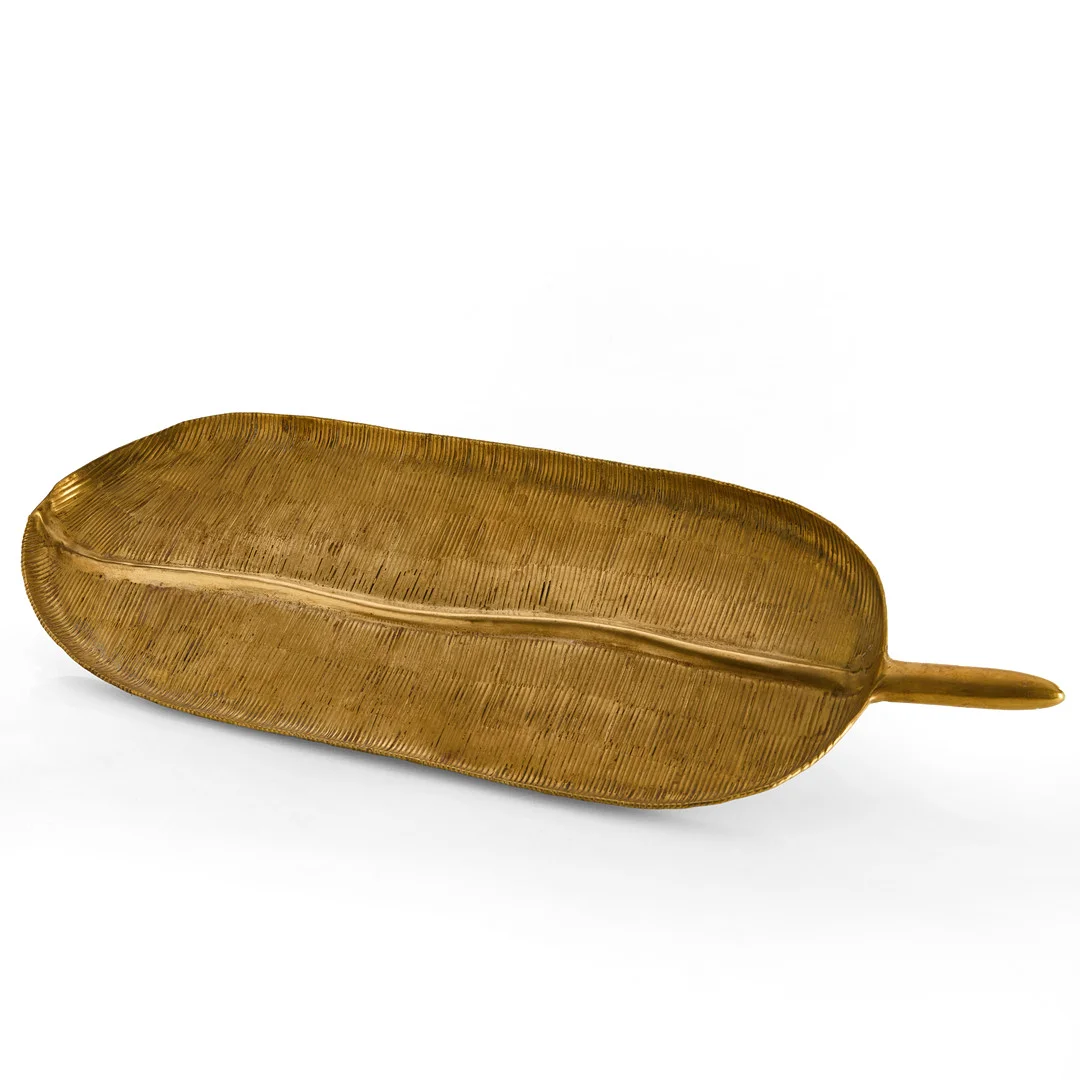 BRICKA, i form av löv. mässing, stämpelmärkt R.O.O.M., 1900/2000-tal. — Pewter, Brass & Copper — Crafoord Auktioner Stockholm