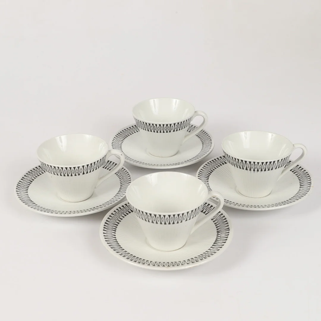 STIG LINDBERG. Kaffeservis, "Bagett", 8 delar, porslin, Gustavsberg. — Tableware — Helsingborgs Auktionskammare