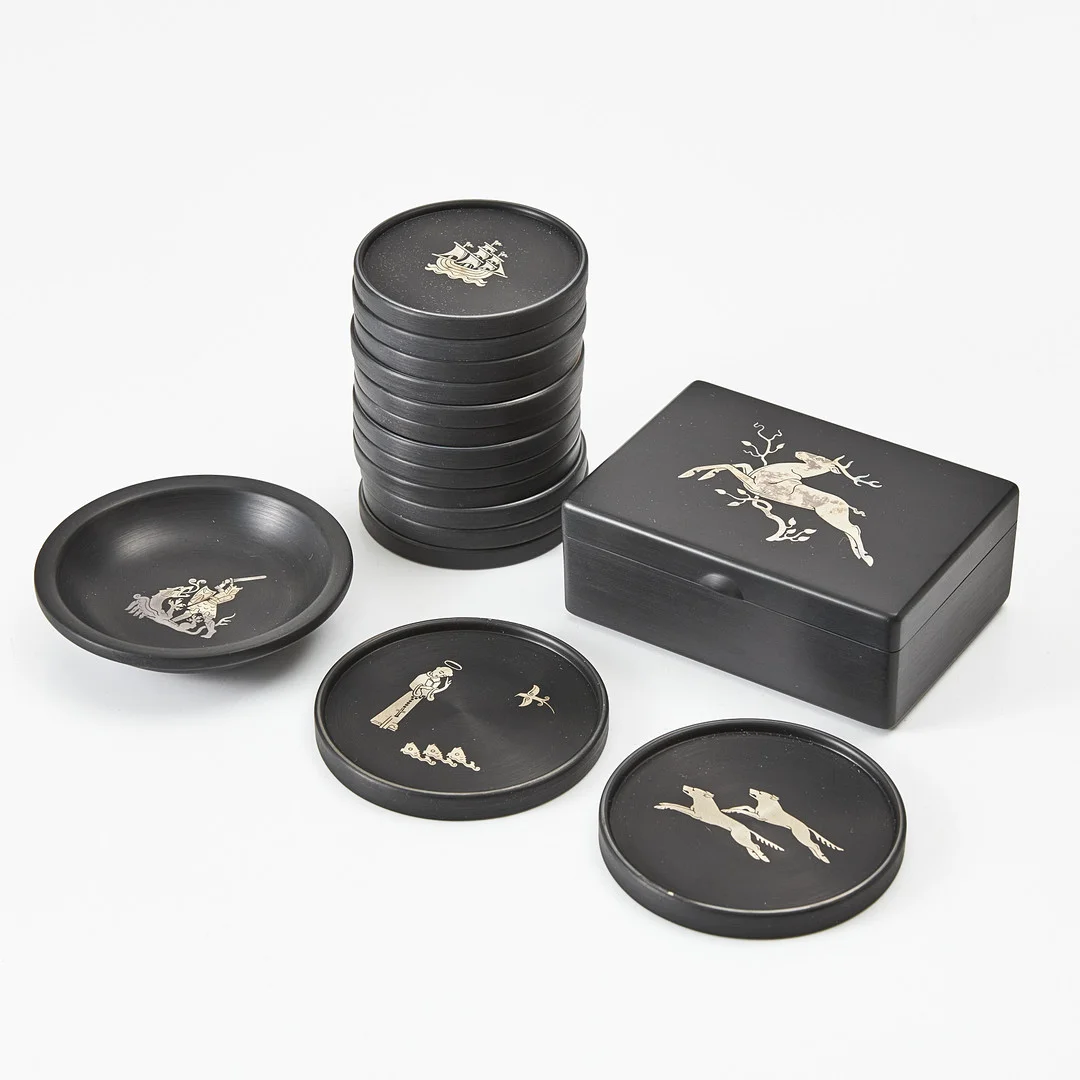 PERSTORP, ask med lock, skål, coasters, 12+2 st, isolit med inläggningar av silver, 1960-tal, olika årsindex. — Silver — Stockholms Auktionsverk Magasin 5