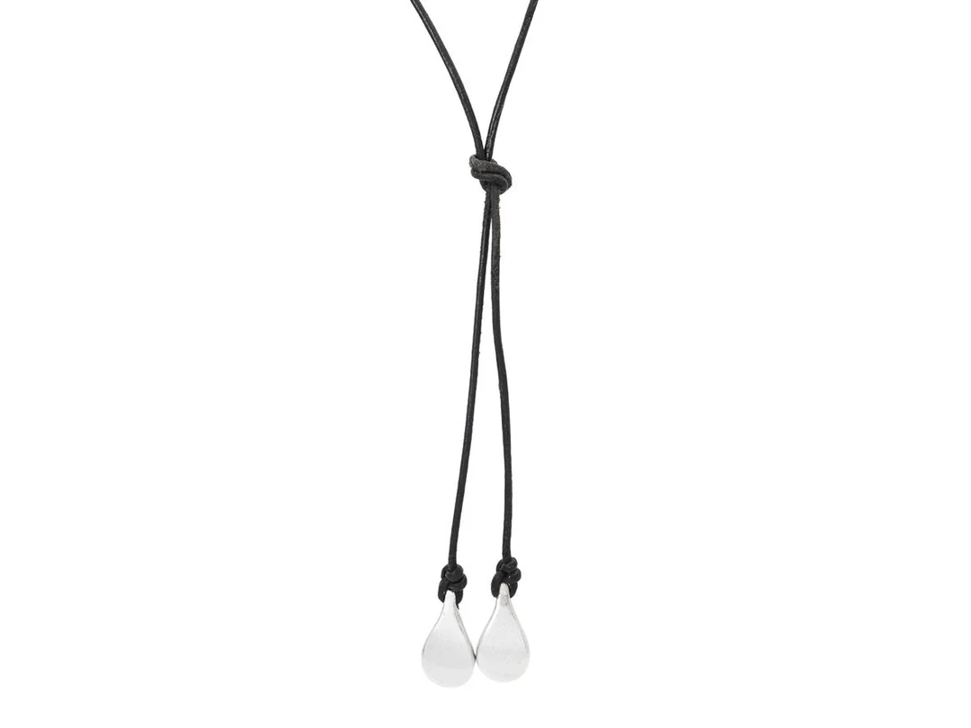 EFVA ATTLING, collier, Happy tears, sterlingsilver/läder, Stockholm 2000 längd 56 cm, vikt 6,7 g, slitage på läder. — Smycken/Collier — Kaplans
