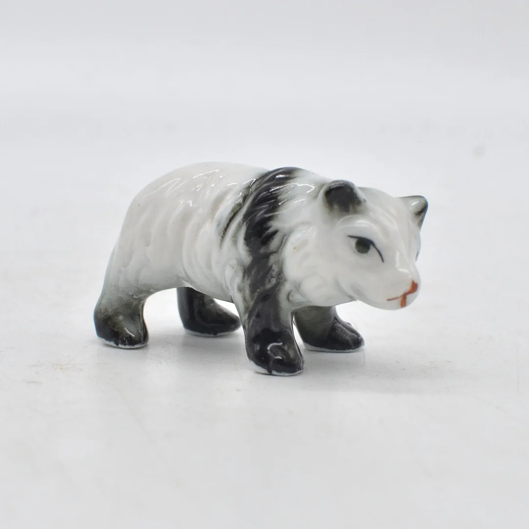 SKULPTUR, PANDABÄR, PORZELLAN, HANDBEMALT, FRÜHES 20. JAHRHUNDERTS. — European — Kunst- und Auktionshaus Kleinhenz
