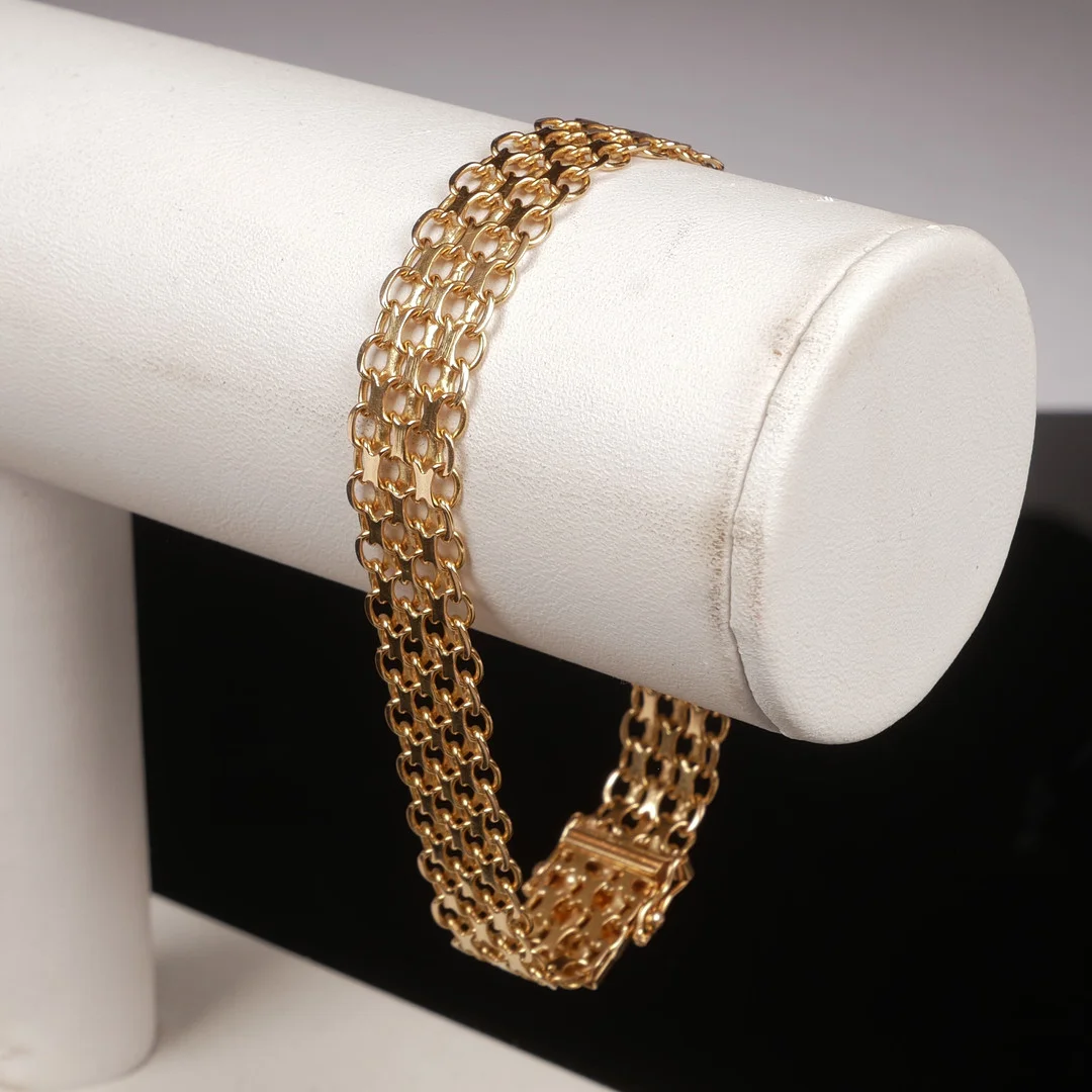 X-LÄNK, 18K guld, Esto Ab Guldvarufirman, Stockholm, 1965. — Bracelets — Auktionsfirma Kenneth Svensson i Kalmar