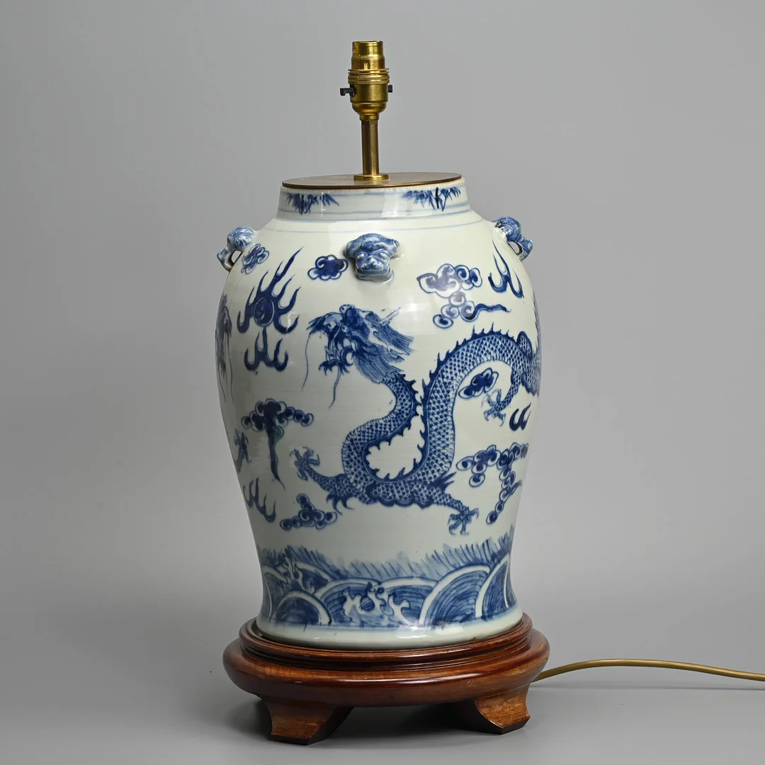 A VINTAGE CHINESE PORCELAIN BLUE AND WHITE LAMP BASE ON WOODEN STAND. — Ceramics & Porcelain — Ma San Auction