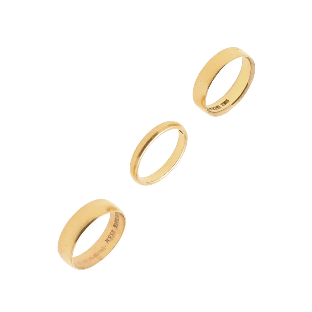 THREE 22CT GOLD WEDDING BANDS. — Rings — Lawrences Auctioneers