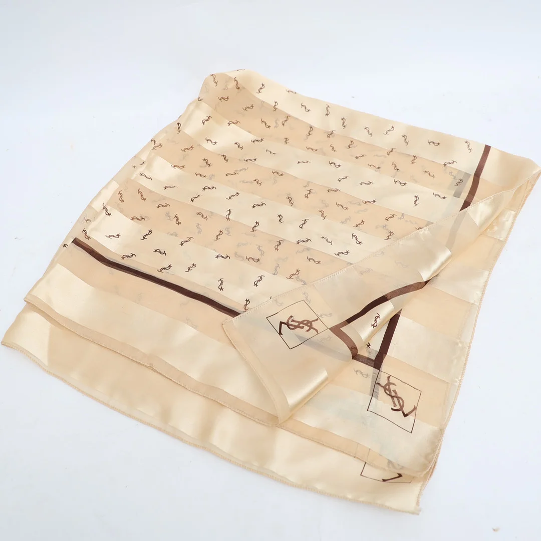 YVES SAINT LAURENT. Scarf. — Vintage & Designer Fashion — Falun Auktionsbyrå