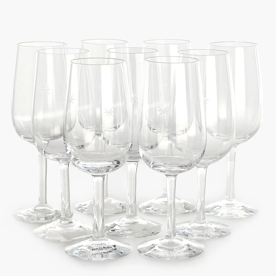 SIGNE PERSSON-MELIN. Vitvinglas, 9 st, "Bouquet", Kosta Boda, klarglas med slipad stjärna. — Tableware — Crafoord Auktioner Stockholm