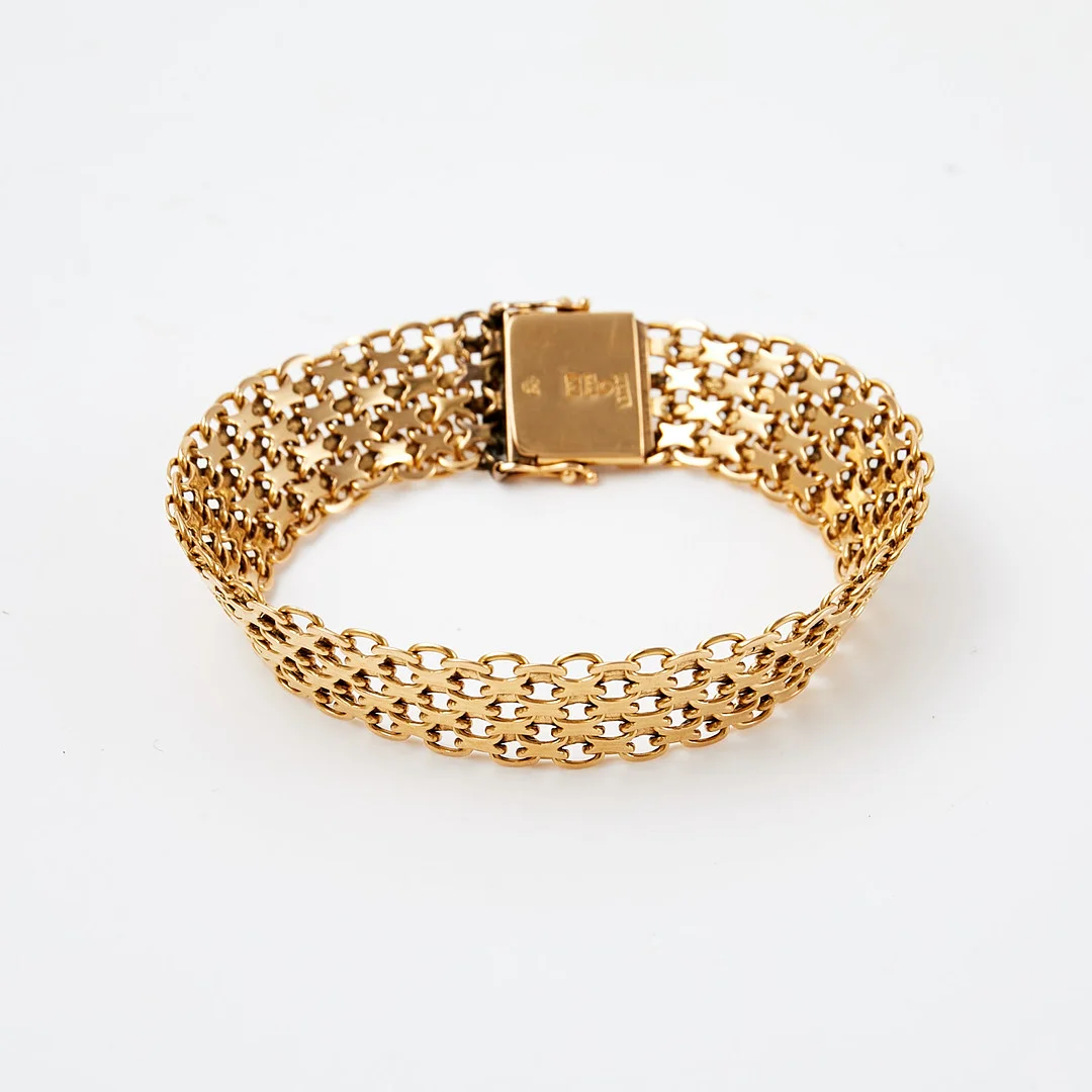 ARMBAND, 18 k guld, x-länk, kistlås, August Mikkov Ab, Stockholm 1964. — Bracelets — Stockholms Auktionsverk Sickla