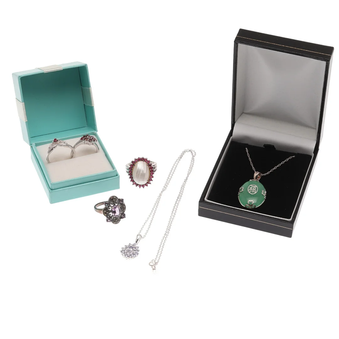 ITEMS OF SILVER JEWELLERY. — Rings — Lawrences Auctioneers