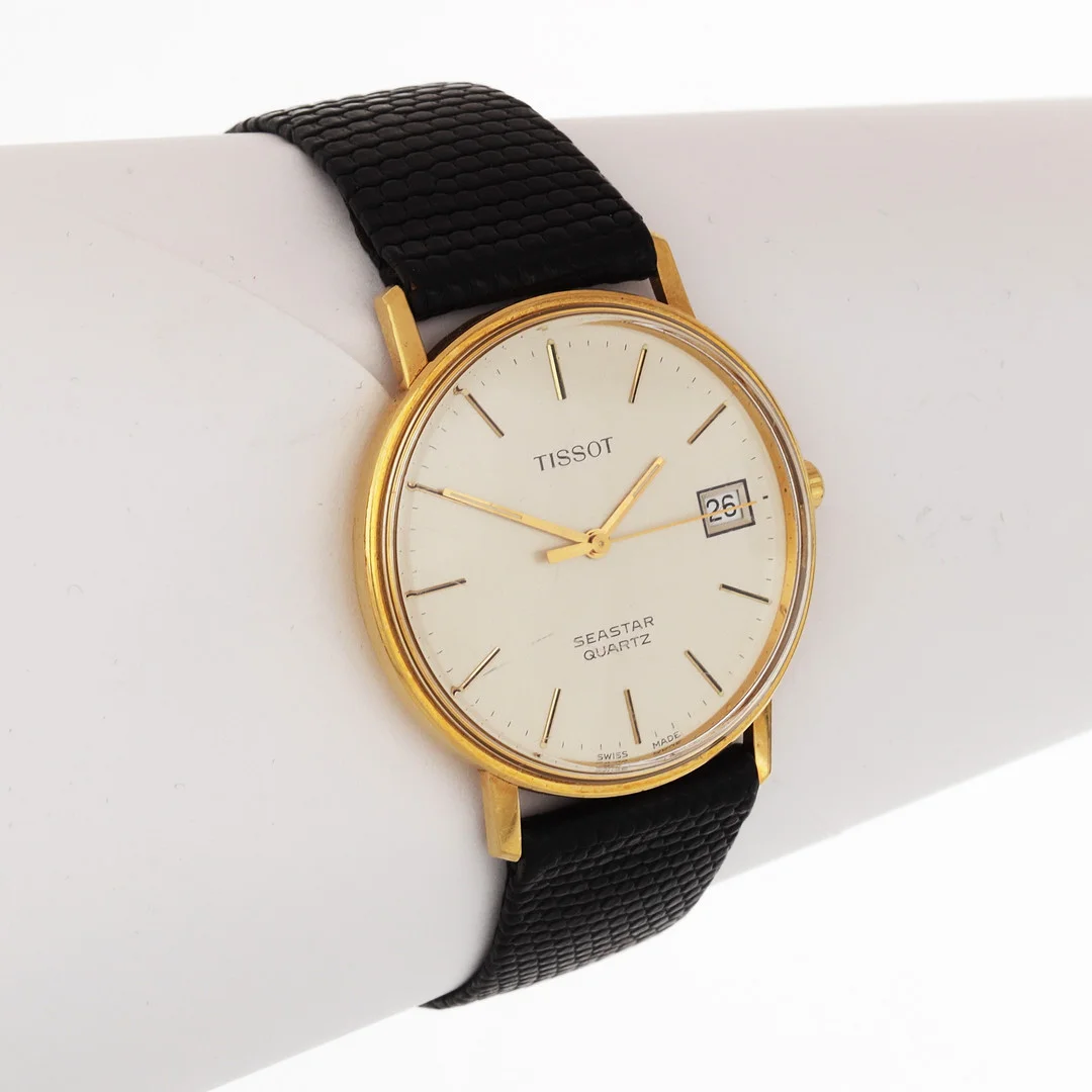 ARMBANDSUR, boett guld 18k, Tissot Seastar Quartz. — Wristwatches — Växjö Auktionskammare