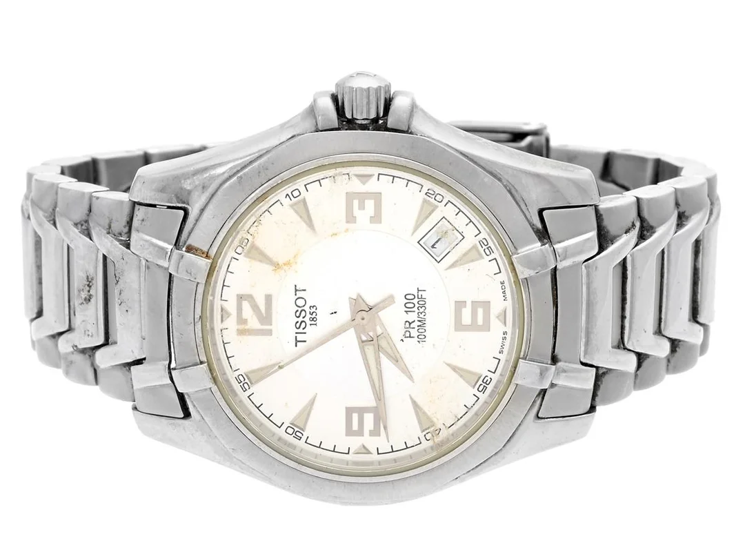 TISSOT, PR 100, (100M), Serie nr. QKK-RA-21727, Boett nr. P660/760, herrur, 36 mm, stål, quartz (går ej), safirglas, datum, originallänk, viklås, ca 2000. — Klockor/Tissot — Kaplans