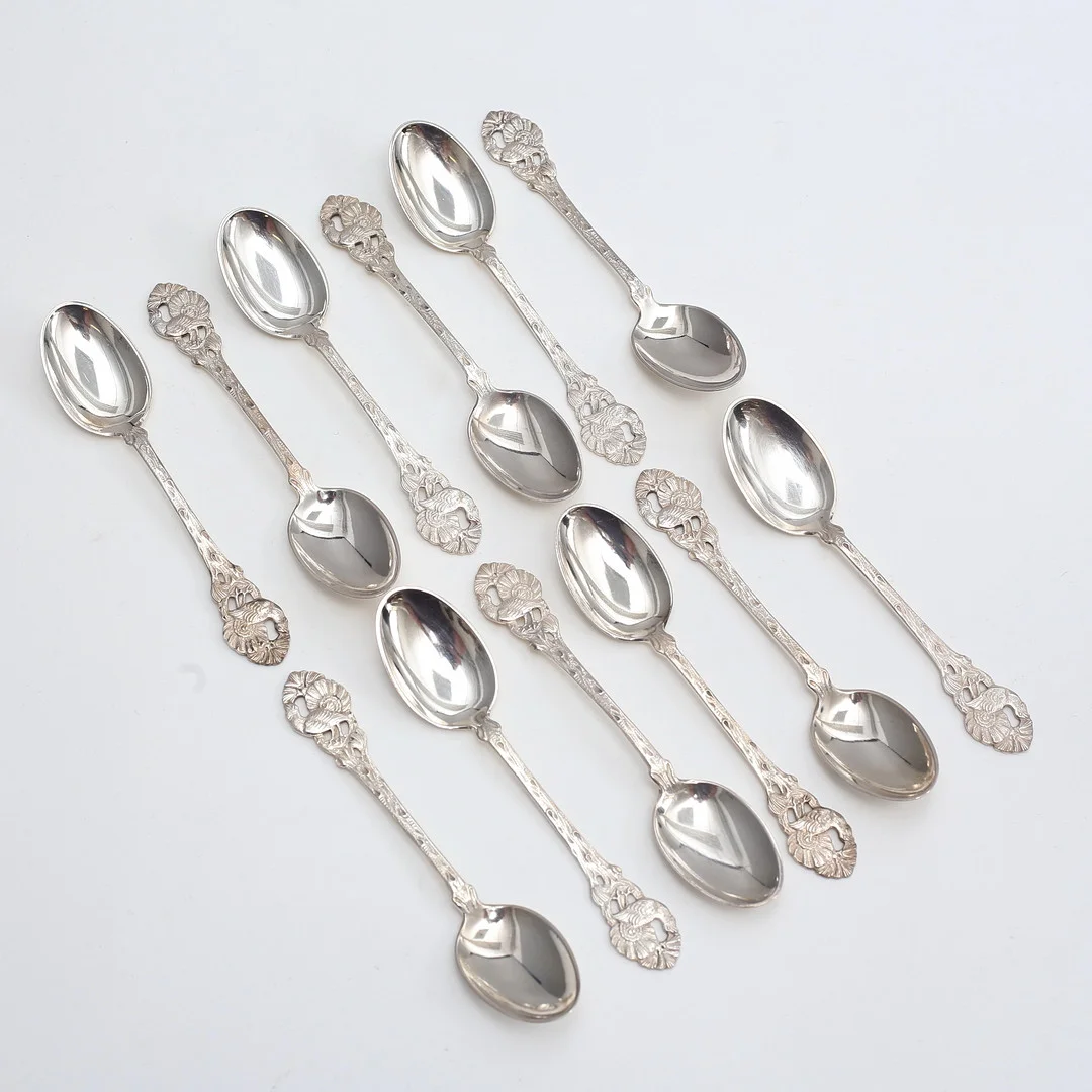 MOCCASKEDAR, 12 st, silver, 94 gram. — Silver — Auktionshuset Thelin & Johansson