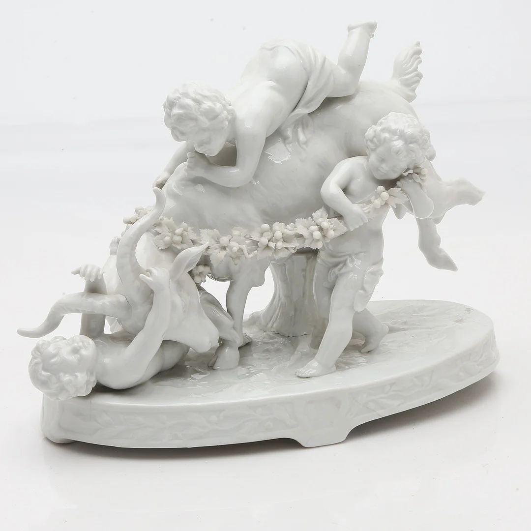 "Bacchic children with a goat", glazed porcelain group by Müller & Co., 20th Century. — European — Balclis