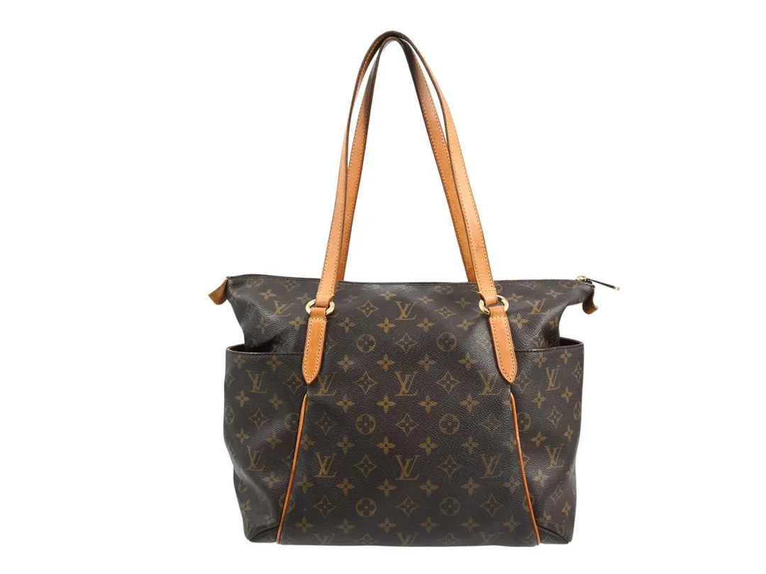 VÄSKA, LOUIS VUITTON, Totally Bag, monogarm canvas, guldfärgad beslag, 36x29x17 cm, märkt TJ2130, år 2010. — Accessoarer/Väskor — Kaplans