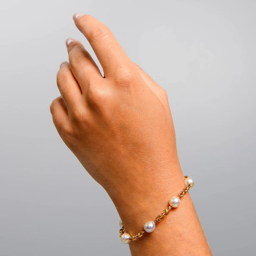 ARMBAND, 18k guld med pärlor, Jo-Ans Guld, Köping, 1964. — Bracelets — Formstad Auktioner