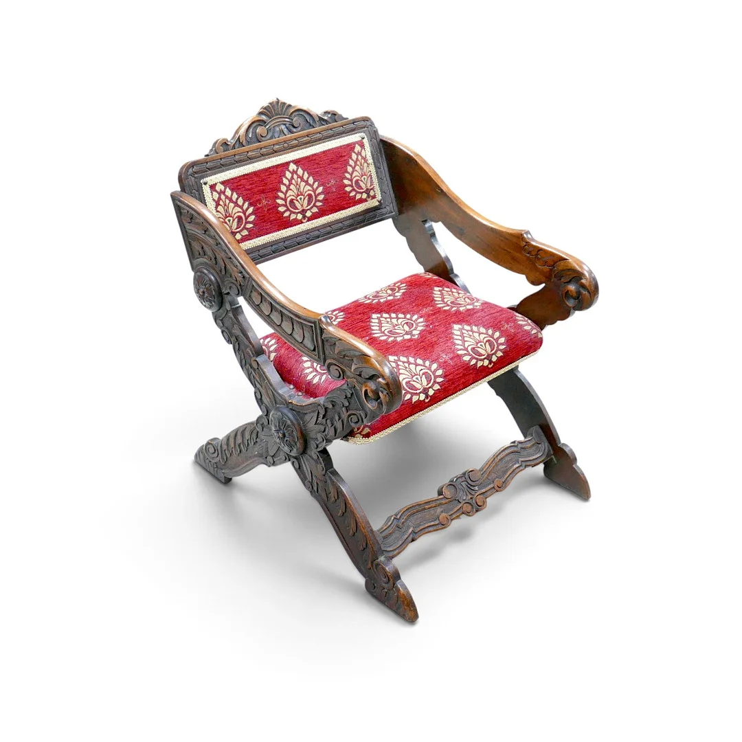 A RENAISSANCE STYLE CARVED WALNUT ARMCHAIR. — Armchairs & Chairs — Batemans of Stamford