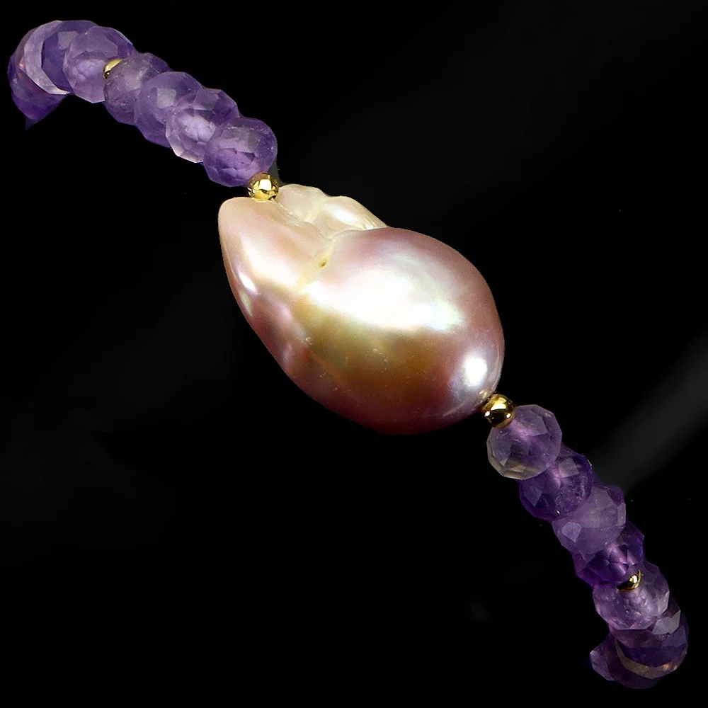 AMETHYST AND BAROQUE PEARL BRACELET. — Bracelets — Chalkwell Auctions