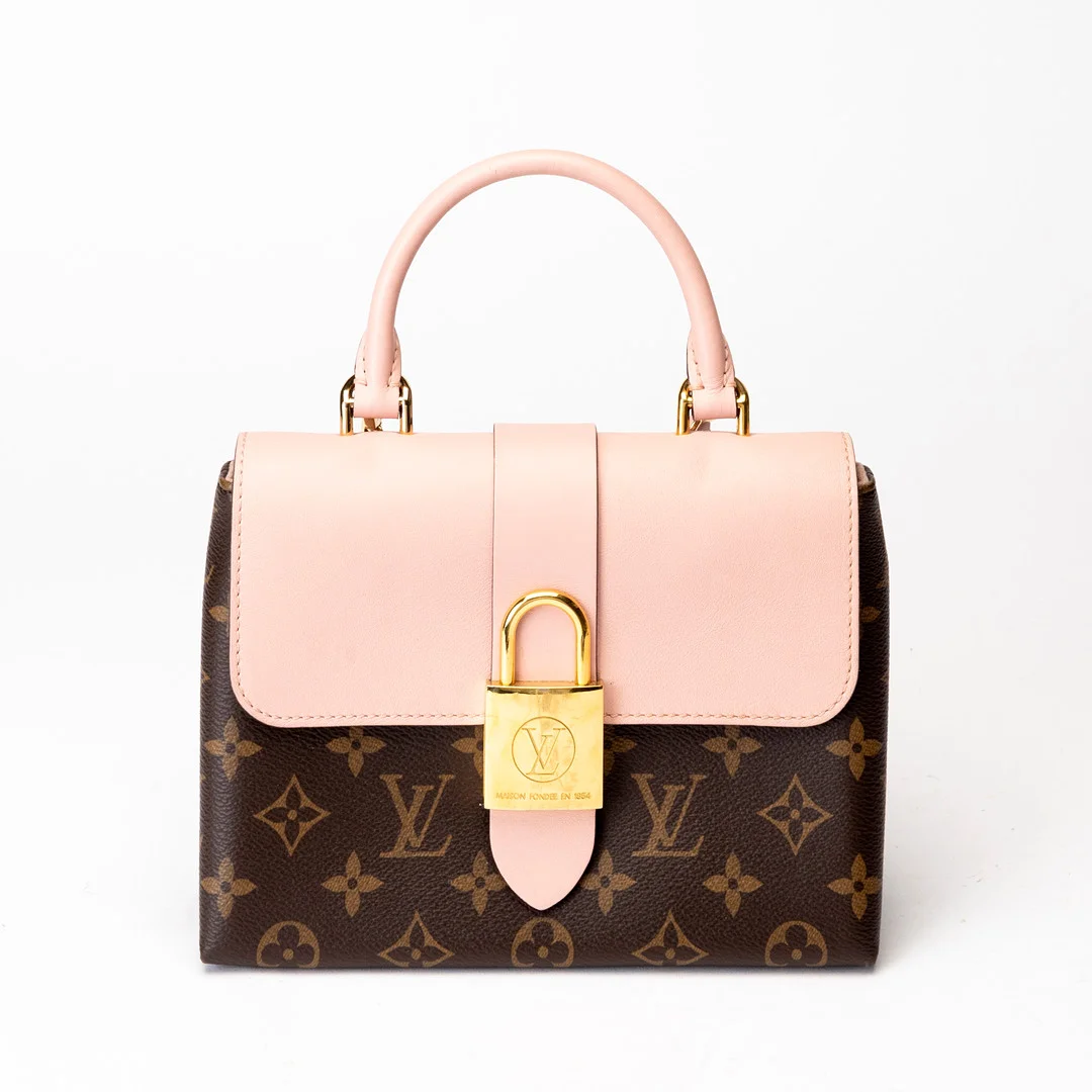 LOUISE VUITTON. Handväska, monogramcanvas och rosa läder, "Locky BB". Paris, Frankrike. — Vintage & Designer Fashion — Auktionshuset Kolonn